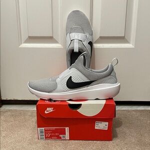 Nike Men’s Ad Comfort Gray and Black Slip-On Sneakers.